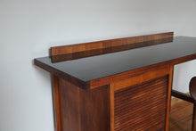 Load image into Gallery viewer, Vintage Mid Century Modern tambour door desk with black laminate top

