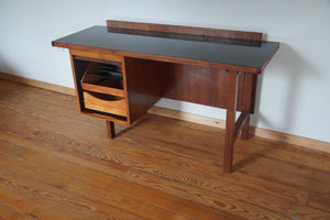 Vintage Mid Century Modern tambour door desk with black laminate top